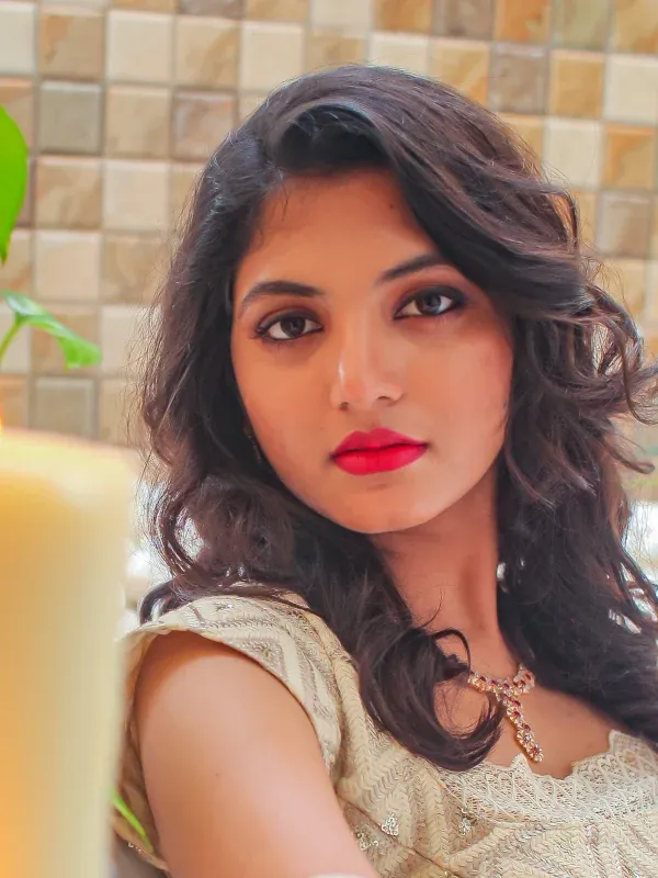 Soft everyday glam with defined lashes and berry pink lip