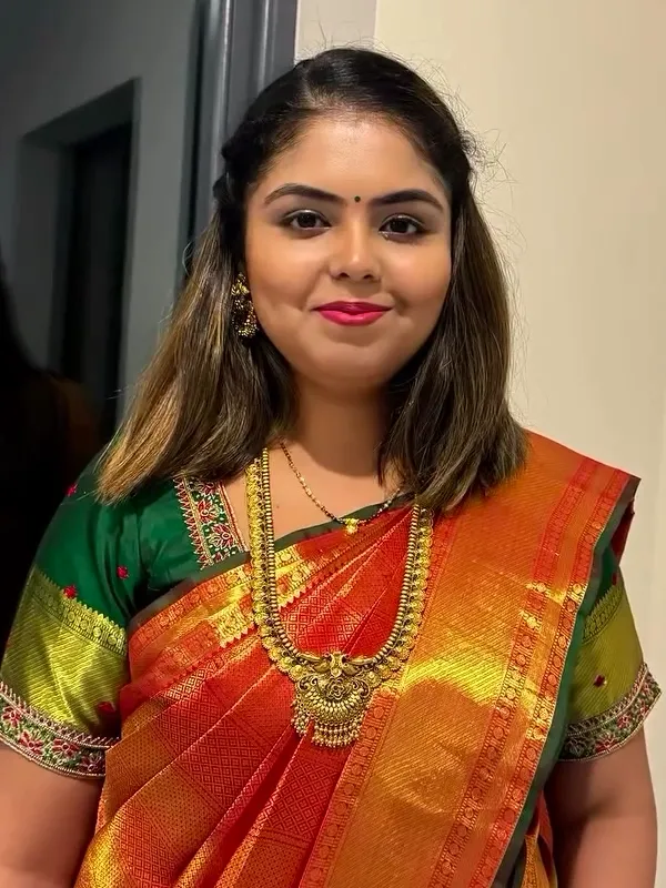 South Asian festive makeup with traditional silk saree and gold temple jewellery
